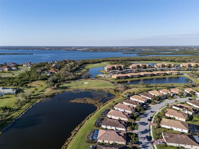 birds eye view of property with a residential view and a water view