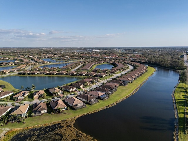 aerial view with a water view and a residential view