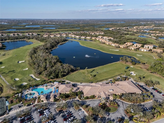 bird's eye view featuring a water view and golf course view