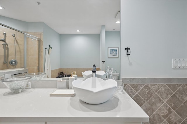 full bathroom featuring a stall shower and recessed lighting