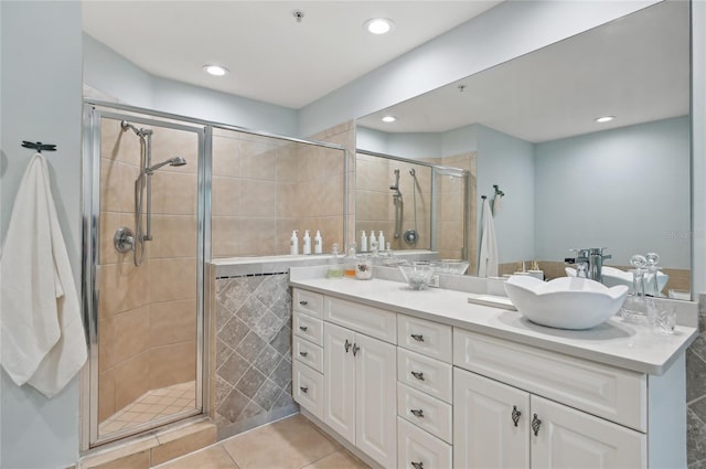 full bath with tile patterned flooring, a shower stall, vanity, and recessed lighting