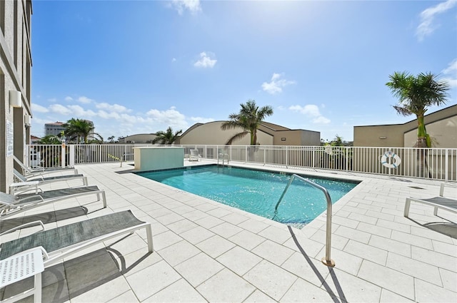 pool with a patio