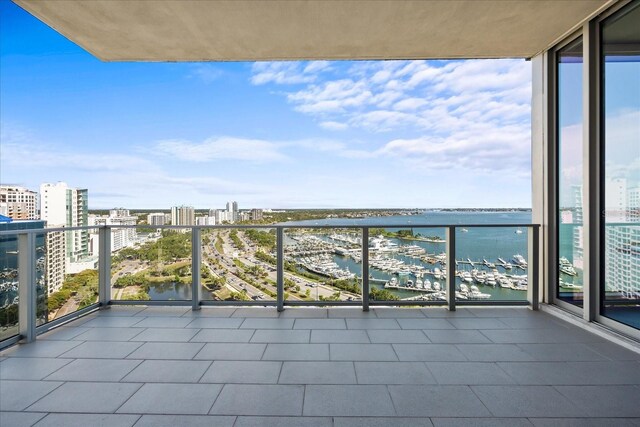 1155 N Gulfstream Ave Unit 1709, Sarasota, FL 34236 - balcony with view of marina, a water view, and a city view