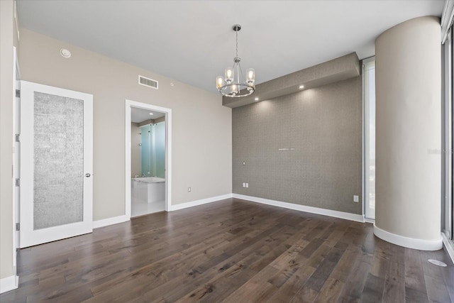 1155 N Gulfstream Ave Unit 1709, Sarasota, FL 34236 - unfurnished dining area featuring a chandelier and dark wood-type flooring