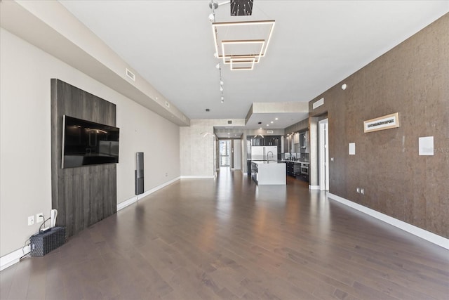 1155 N Gulfstream Ave Unit 1709, Sarasota, FL 34236 - unfurnished living room with dark wood finished floors
