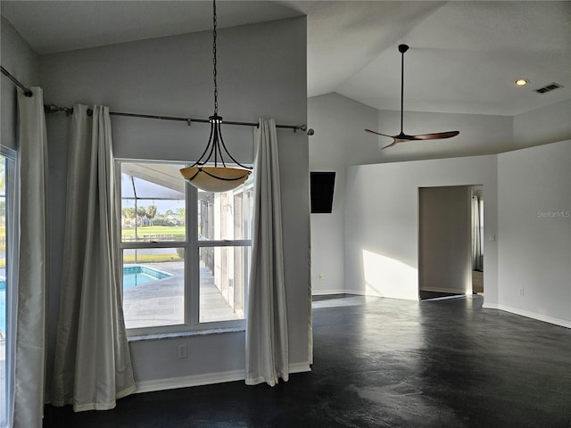 unfurnished dining area featuring lofted ceiling, visible vents, ceiling fan, and baseboards