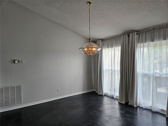 1211 Peridot Ln, Sun City Center, FL 33573 - unfurnished room featuring visible vents, a textured ceiling, plenty of natural light, and a notable chandelier