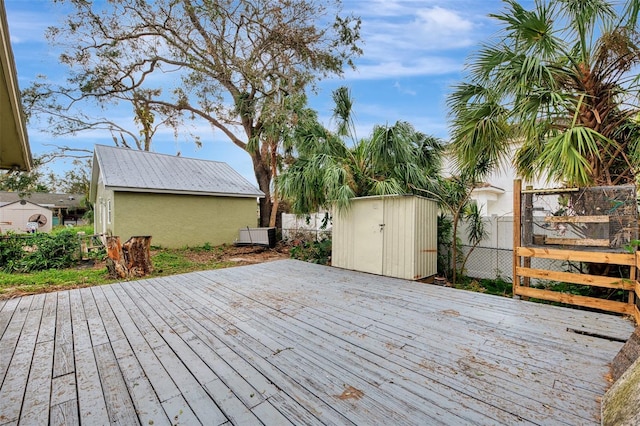 deck featuring a shed