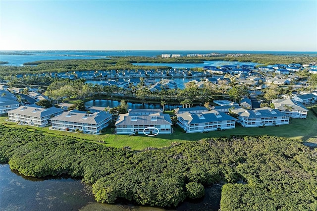 birds eye view of property featuring a residential view and a water view