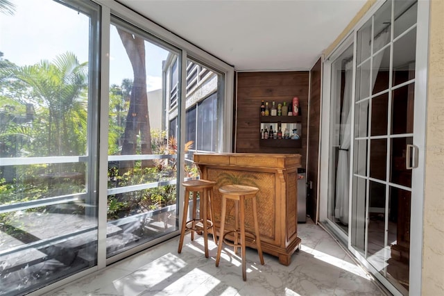 sunroom / solarium with bar area