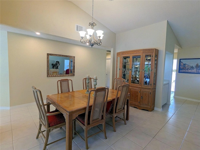 dining area featuring high vaulted ceiling, an inviting chandelier, and light tile patterned floors