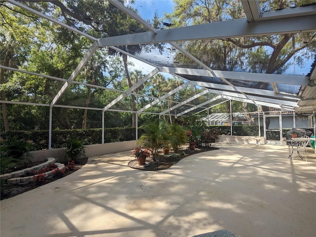 view of patio / terrace with a lanai