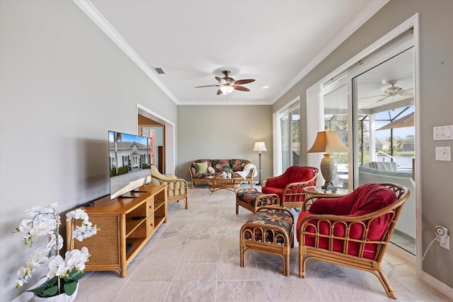 interior space featuring ornamental molding and ceiling fan