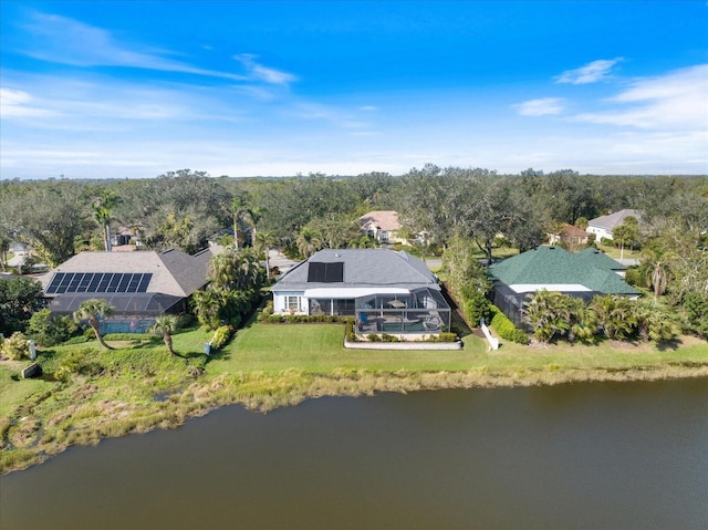 drone / aerial view with a water view