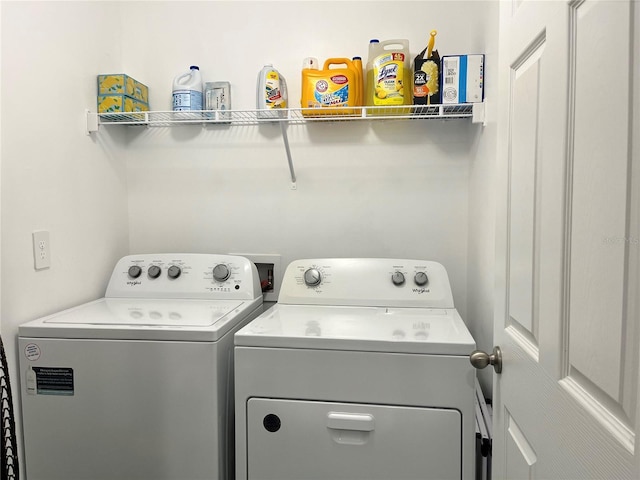 laundry area with separate washer and dryer