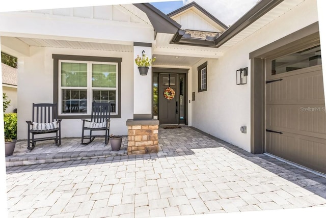 property entrance with a garage