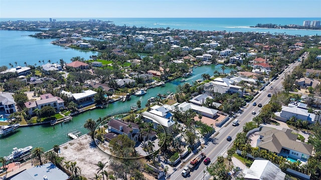 aerial view with a water view and a residential view