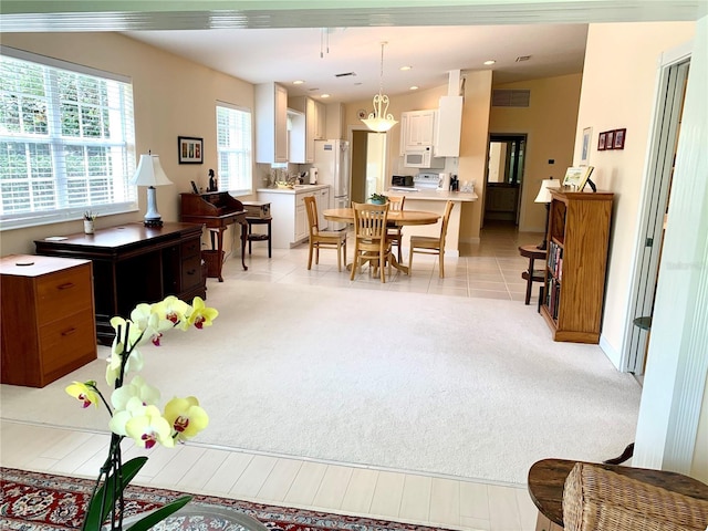 7649 Quinto Dr, Sarasota, FL 34238 - living room featuring baseboards and visible vents