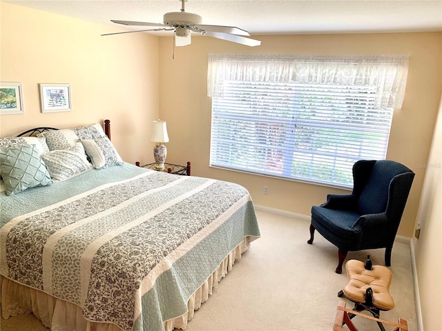 7649 Quinto Dr, Sarasota, FL 34238 - bedroom featuring carpet flooring, baseboards, and ceiling fan