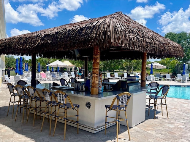7649 Quinto Dr, Sarasota, FL 34238 - exterior space with fence and outdoor dry bar