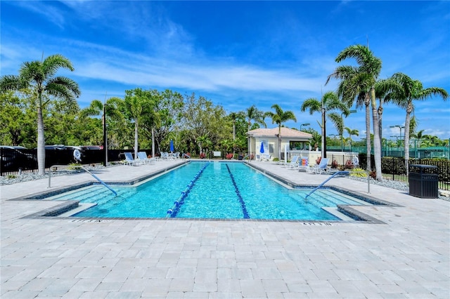 7649 Quinto Dr, Sarasota, FL 34238 - community pool featuring fence and a patio area