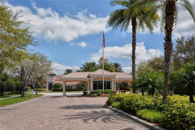 7649 Quinto Dr, Sarasota, FL 34238 - view of community featuring curved driveway