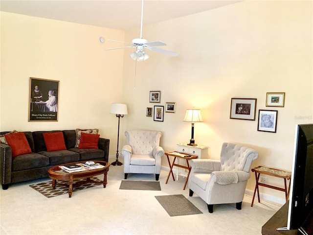7649 Quinto Dr, Sarasota, FL 34238 - carpeted living area with ceiling fan and baseboards