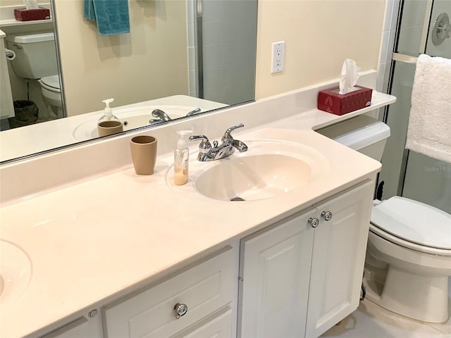 7649 Quinto Dr, Sarasota, FL 34238 - full bathroom featuring toilet, a stall shower, and vanity