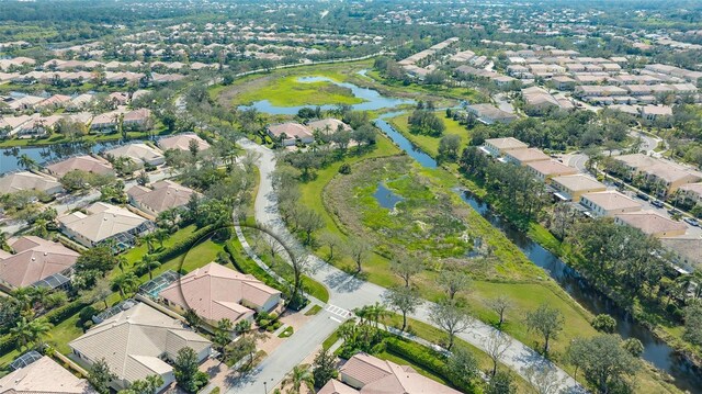 7649 Quinto Dr, Sarasota, FL 34238 - drone / aerial view featuring a residential view and a water view