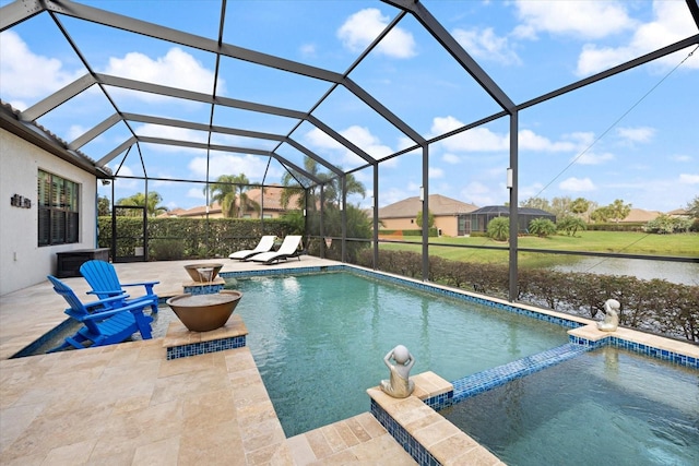 view of pool featuring a patio and glass enclosure