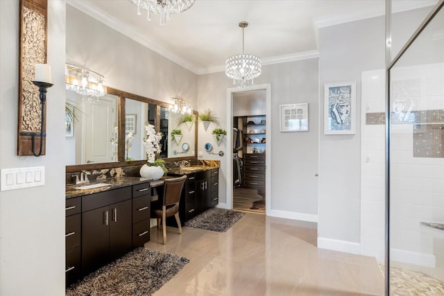 bathroom featuring crown molding, tiled shower, vanity, and an inviting chandelier