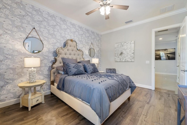 bedroom featuring ornamental molding, ceiling fan, and dark hardwood / wood-style flooring