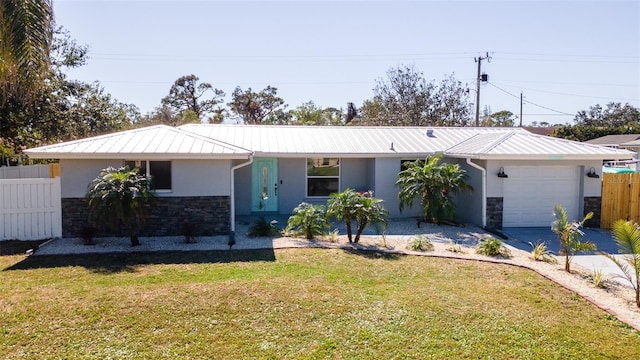 ranch-style home with a garage and a front lawn