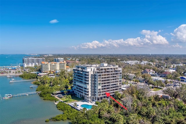 drone / aerial view featuring a water view and a city view