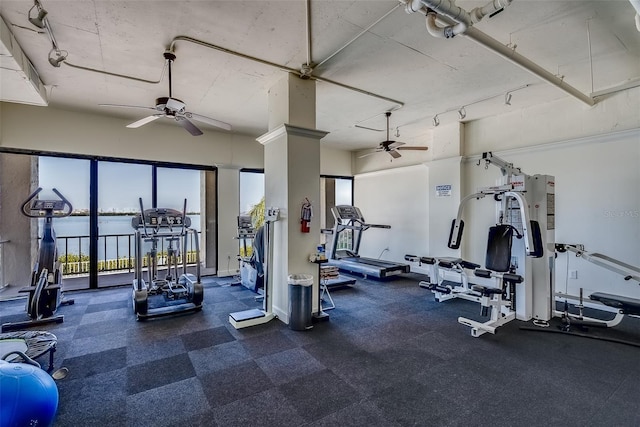 workout area featuring a ceiling fan