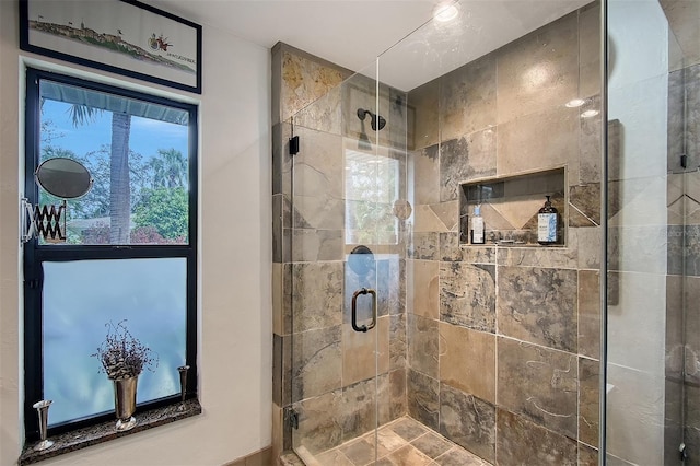 bathroom featuring a shower stall