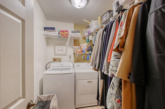 laundry area featuring laundry area and separate washer and dryer