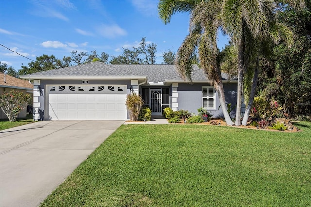 single story home featuring a garage, a shingled roof, concrete driveway, stucco siding, and a front yard