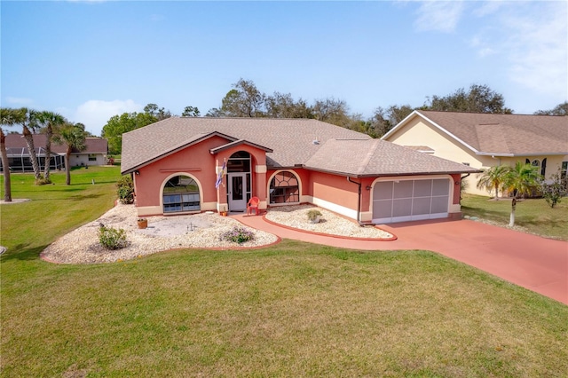 ranch-style house with a garage and a front yard