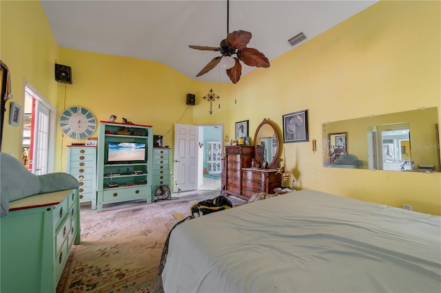 carpeted bedroom featuring ceiling fan and lofted ceiling