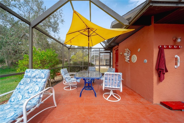 view of patio / terrace with a lanai