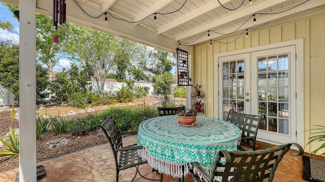 view of patio with outdoor dining space and french doors