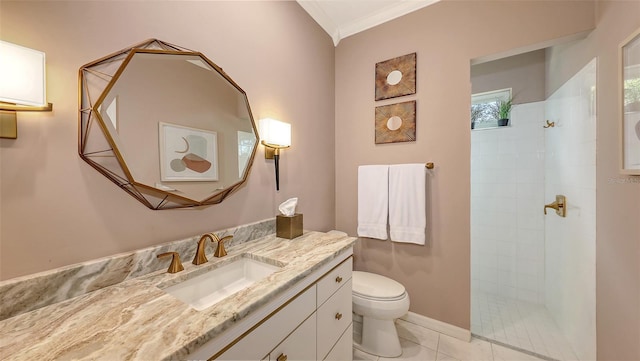 bathroom with crown molding, toilet, vanity, a walk in shower, and tile patterned floors