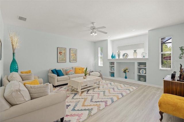 8956 Stone Harbour Loop, Bradenton, FL 34212 - living room featuring ceiling fan, visible vents, wood finished floors, baseboards, and recessed lighting