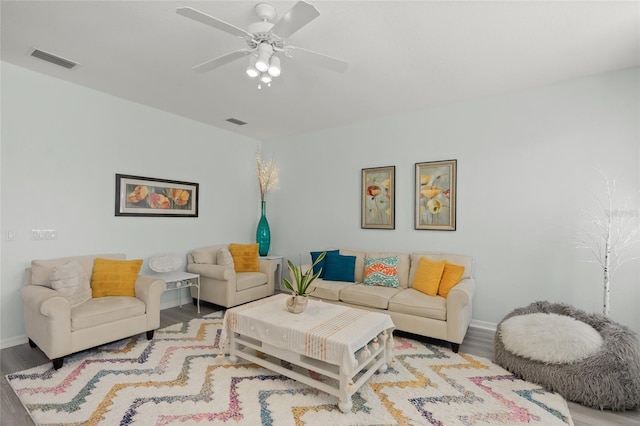 8956 Stone Harbour Loop, Bradenton, FL 34212 - living area featuring visible vents, baseboards, ceiling fan, and wood finished floors