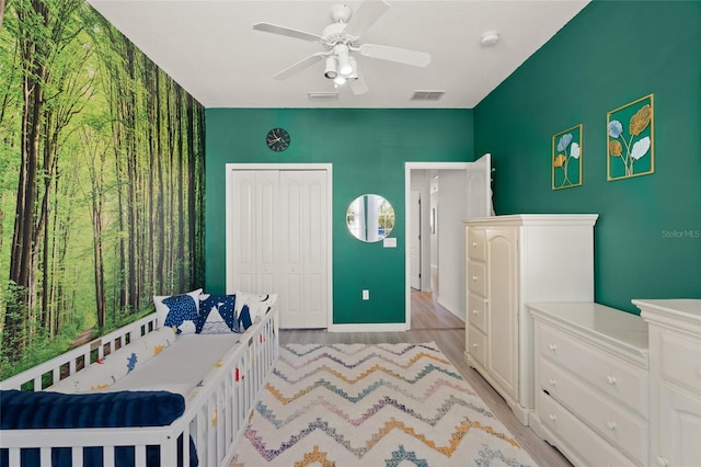 8956 Stone Harbour Loop, Bradenton, FL 34212 - bedroom featuring baseboards, a closet, light wood finished floors, and visible vents