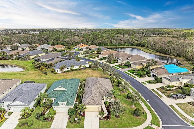 drone / aerial view with a water view