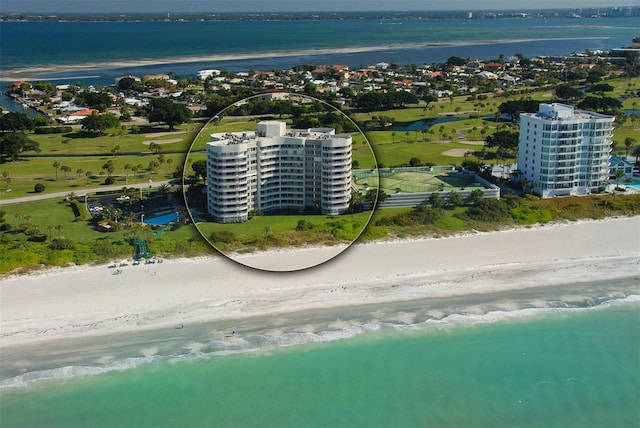 aerial view featuring a water view and a view of the beach