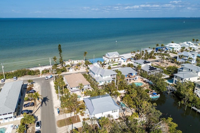 aerial view featuring a residential view and a water view