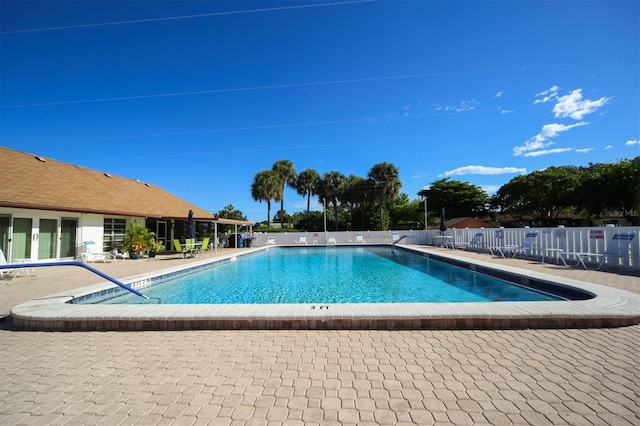 view of pool featuring a patio area